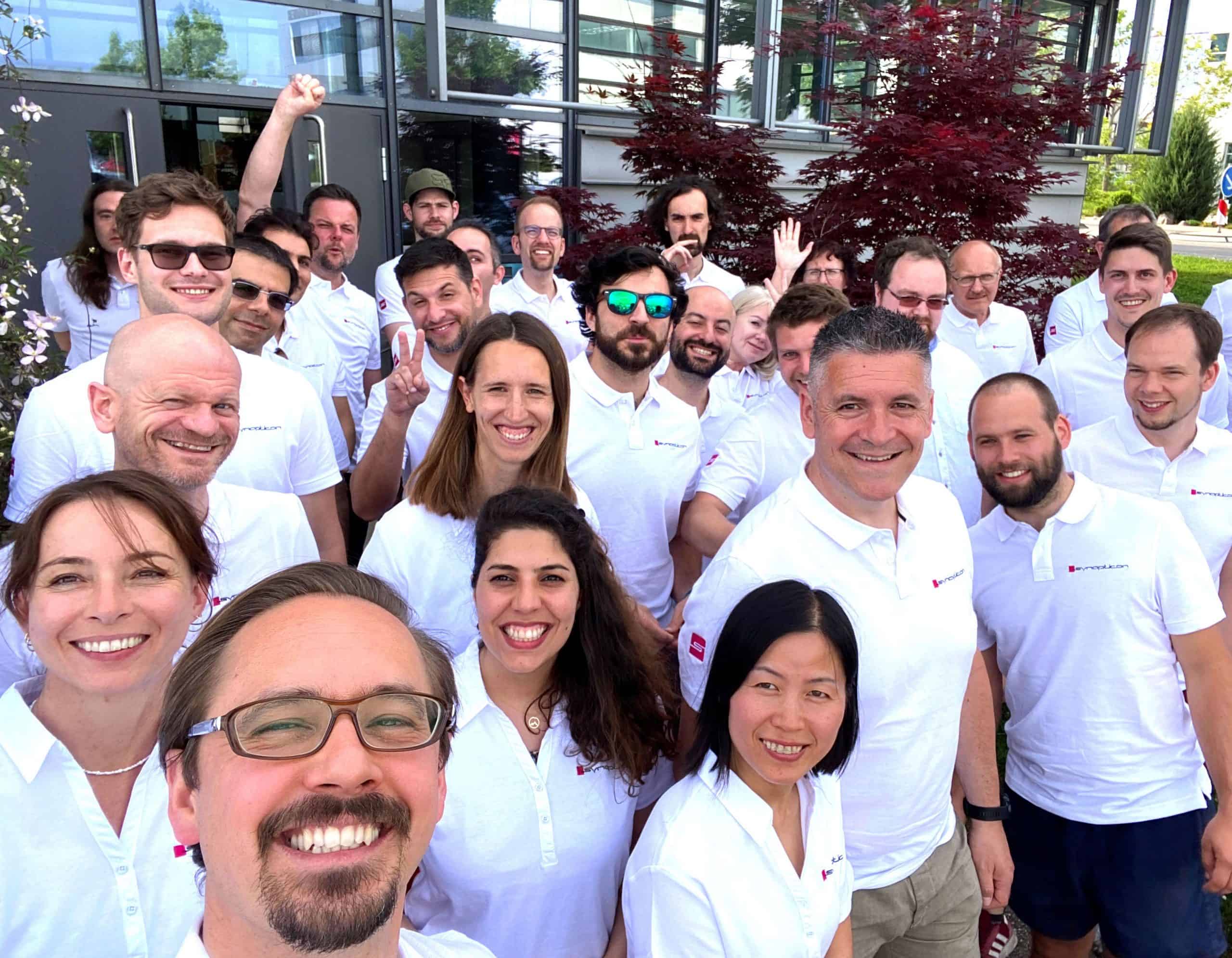 a group of people looking at the camera