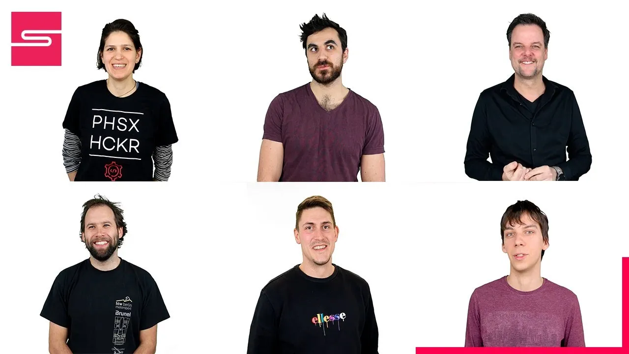 a group of people standing next to each other