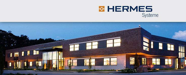 HERMES Systeme Firmengebäude bei Nacht