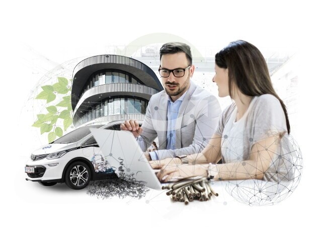 Geschäftsmann und Geschäftsfrau mit Laptop und Fahrzeug